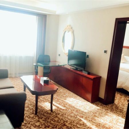 New Paris Hotel Harbin Extérieur photo