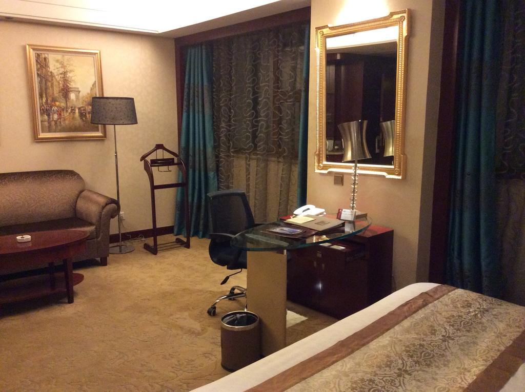 New Paris Hotel Harbin Chambre photo
