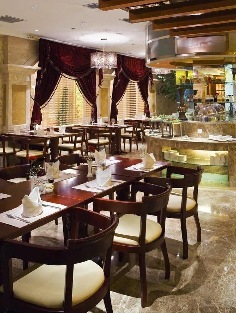 New Paris Hotel Harbin Extérieur photo