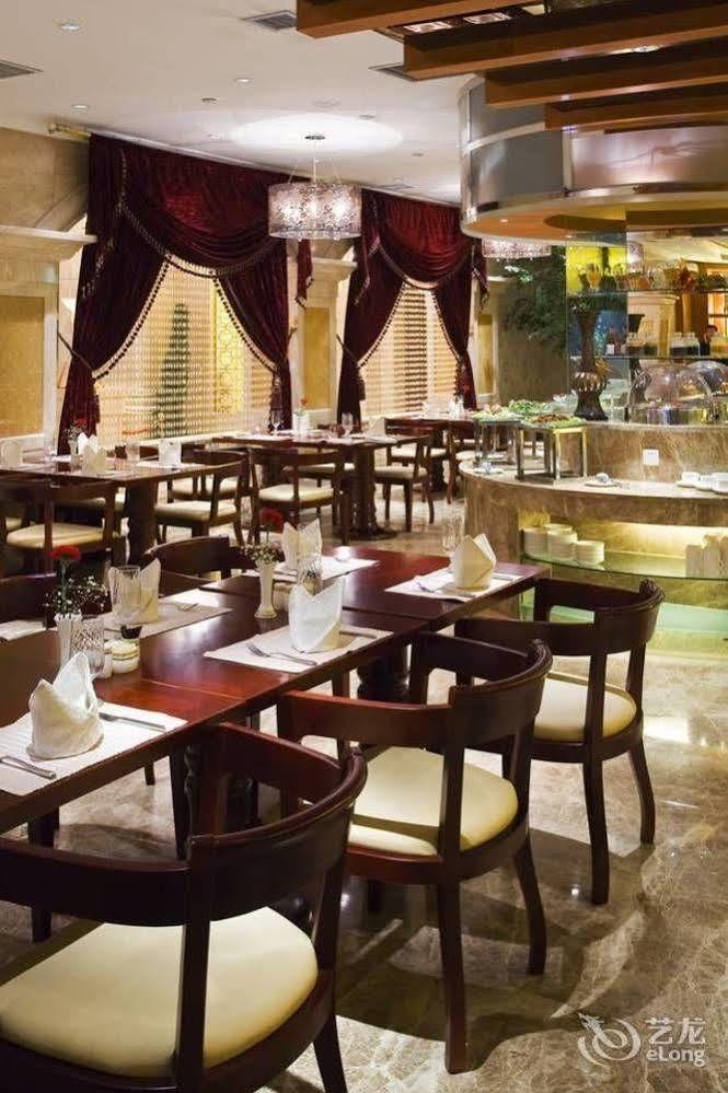 New Paris Hotel Harbin Extérieur photo
